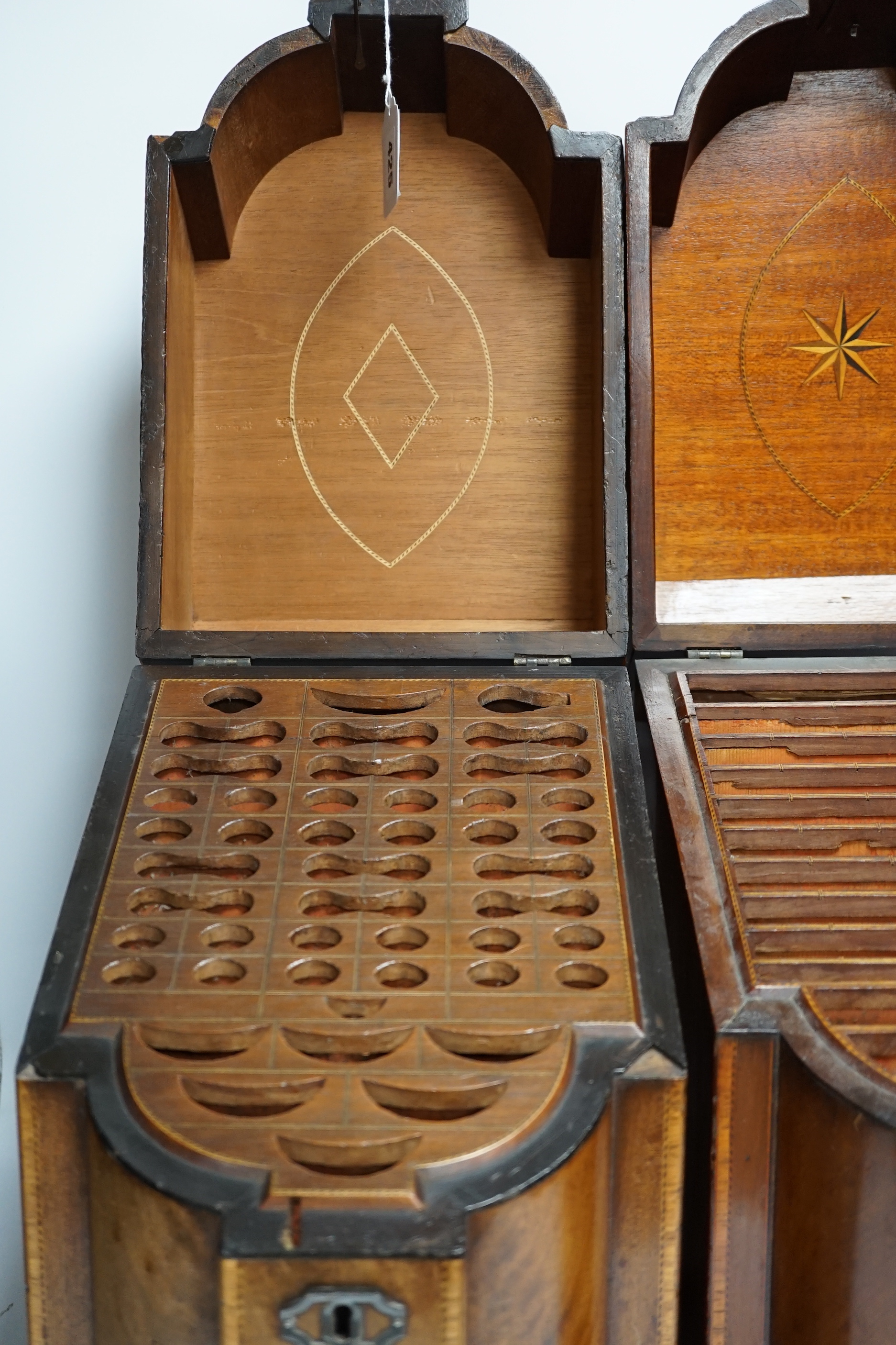 A pair of George III mahogany inlaid knife boxes with shield shaped lock plates (one converted), 38cm high